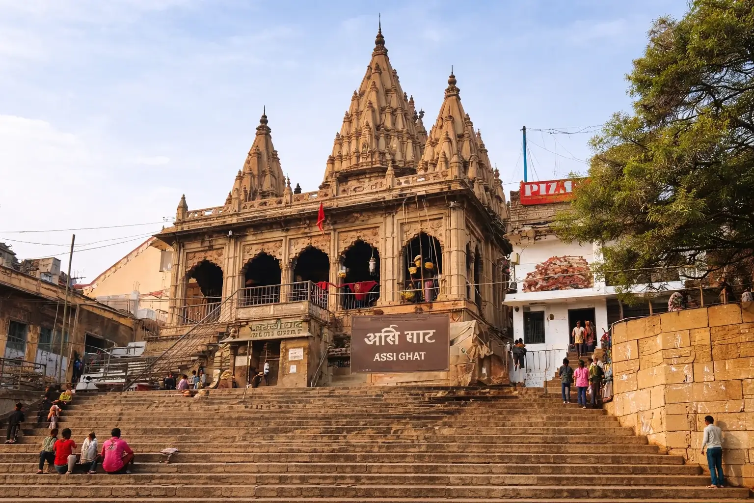 Sunrise yoga and morning rituals at Assi Ghat, Varanasi